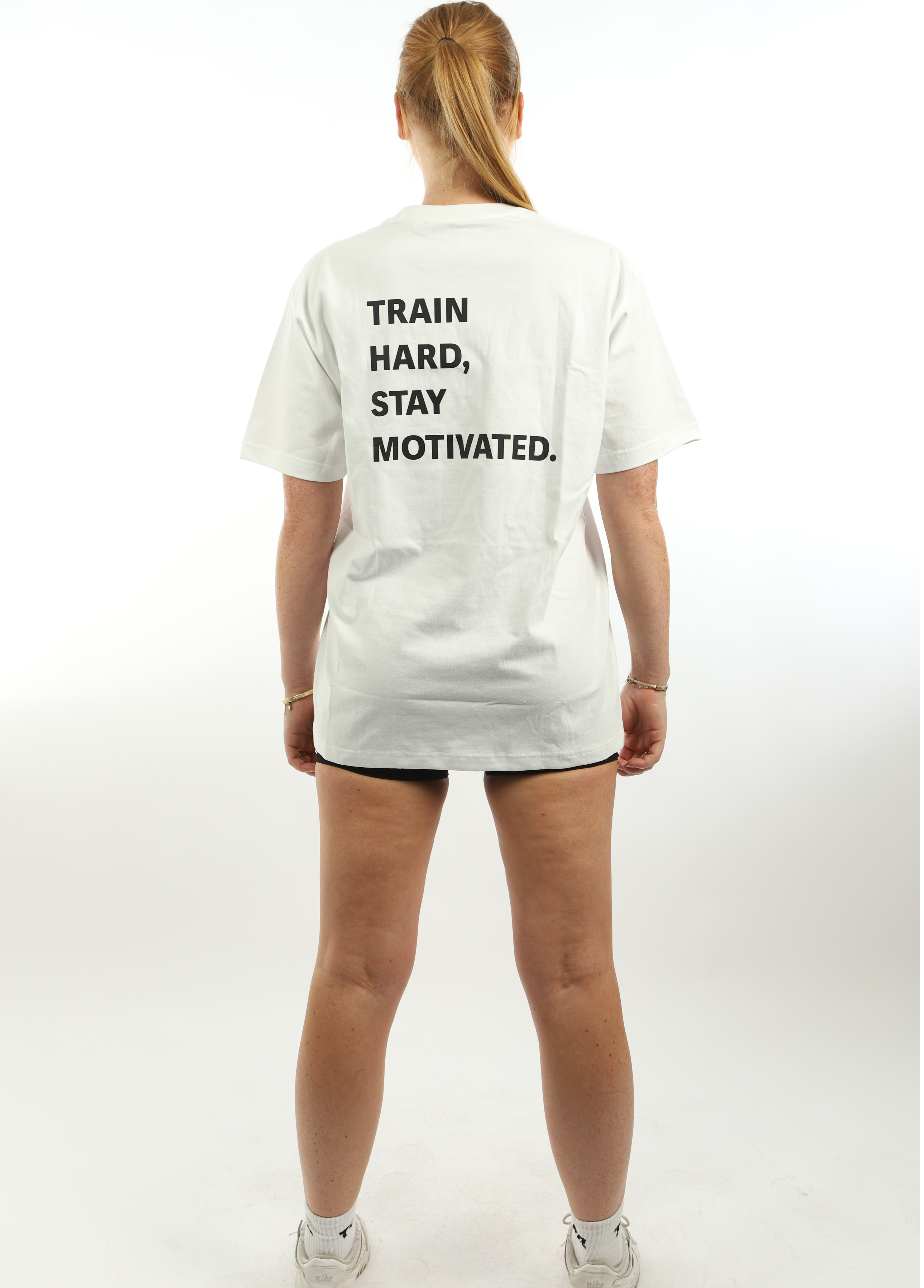 Oversized T-Shirt Porcelain White TRAIN HARD, STAY MOTIVATED.