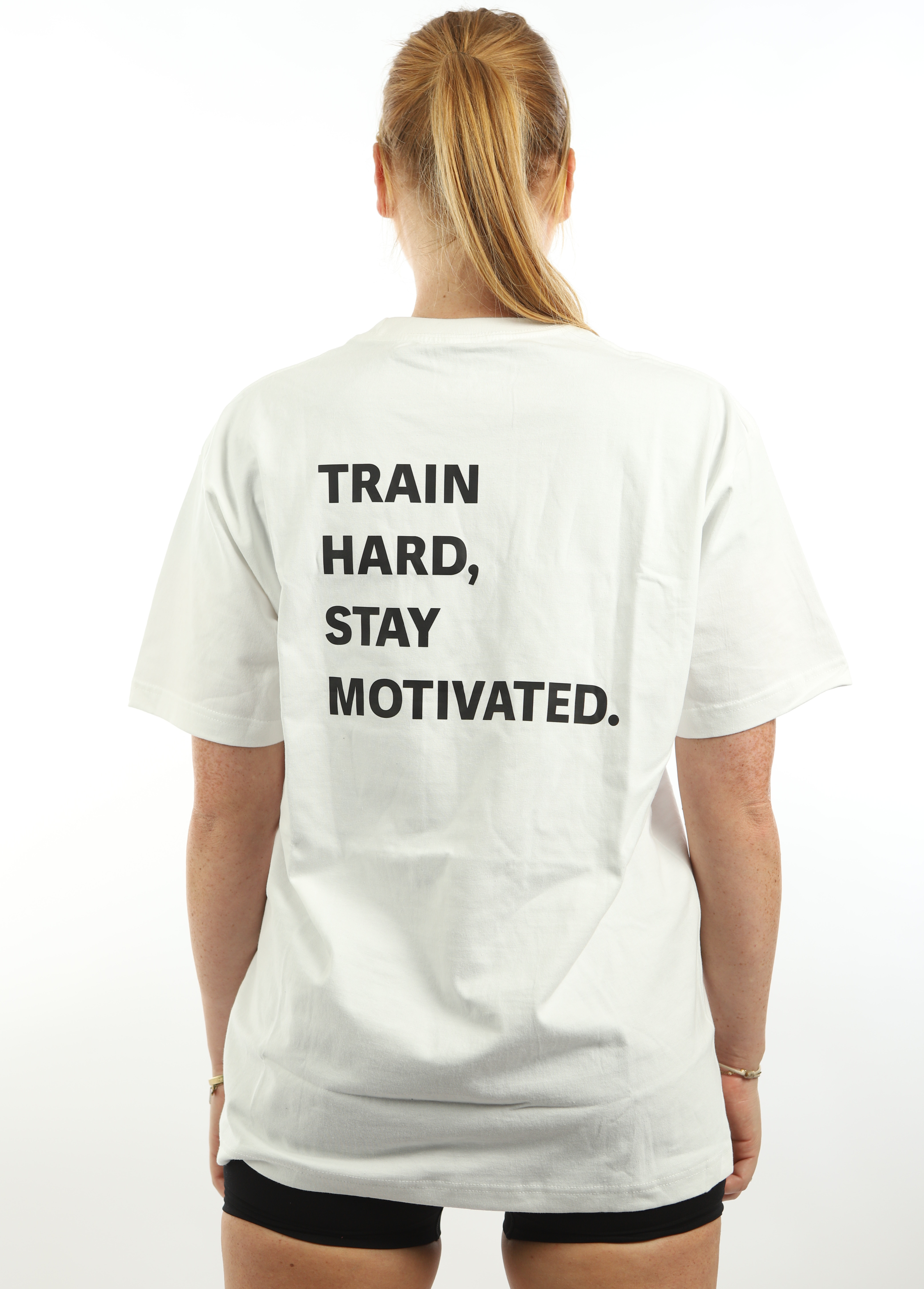 Oversized T-Shirt Porcelain White TRAIN HARD, STAY MOTIVATED.